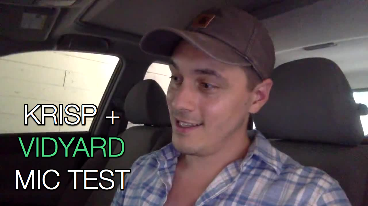 A man in a car doing a Krips and Vidyard microphone test.